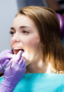 patient getting a dental checkup 